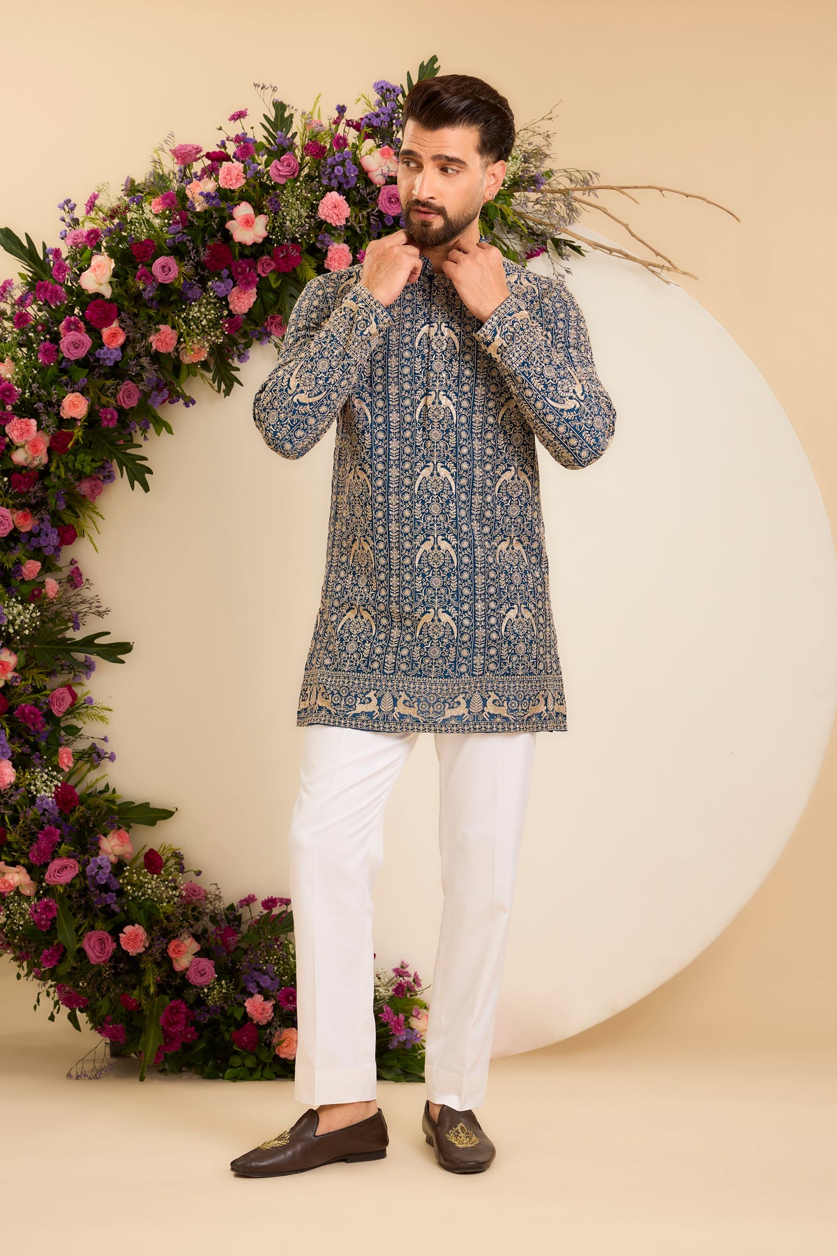 A Regal Blue short Kurta Woven with Ornate Zari Details
