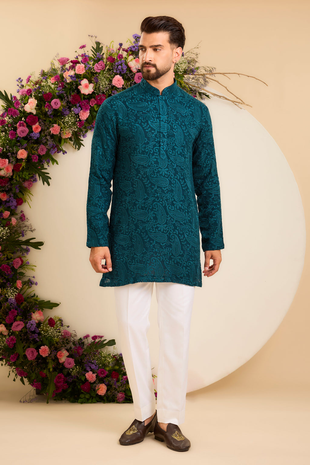 A Teal Short chikankari Kurta with Intricate Paisley Embroidery