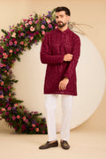 A  red/maroon chikankari Short Kurta with Intricate Paisley Embroidery