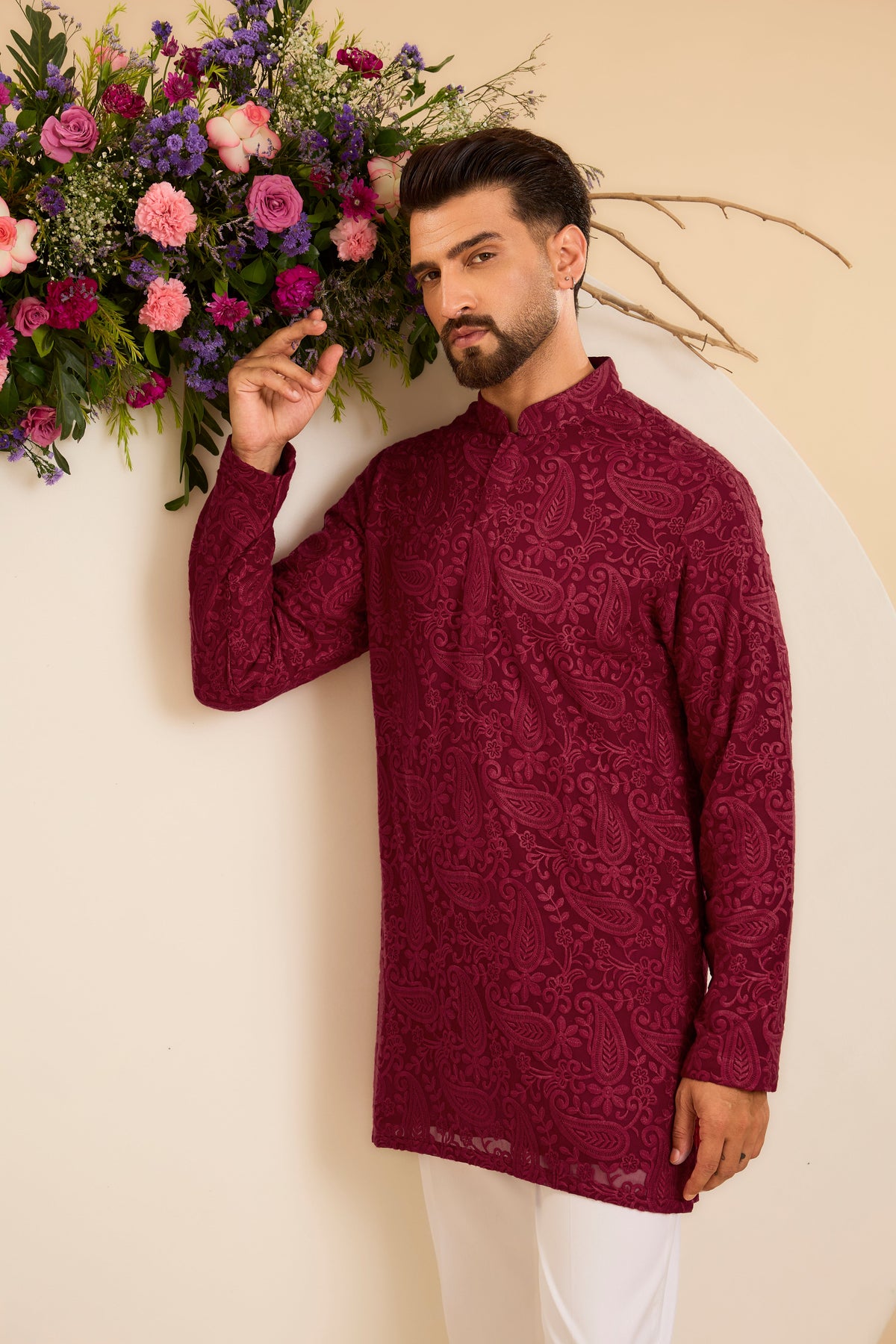 A  red/maroon chikankari Short Kurta with Intricate Paisley Embroidery