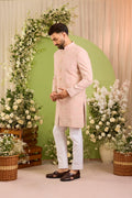 The Palais — A Pink Short Sherwani Richly Worked in Florals