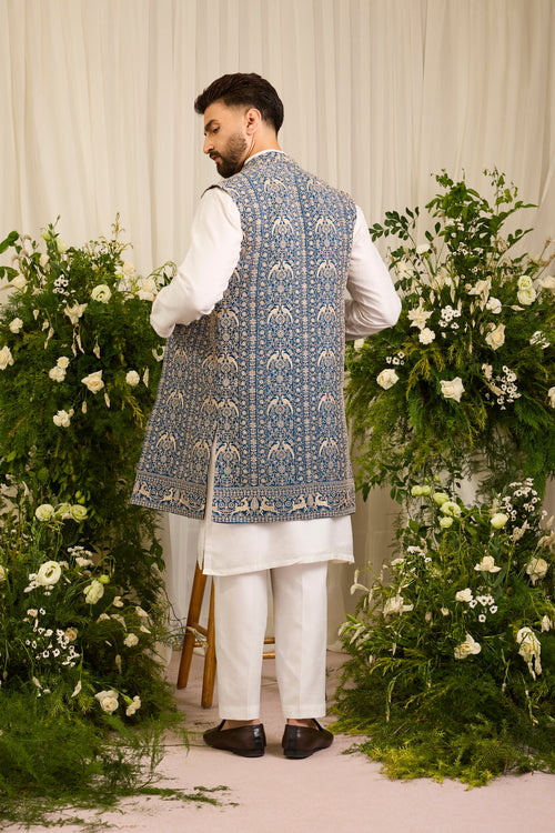 A Regal Blue long open jacket Woven with Ornate Zari Details
