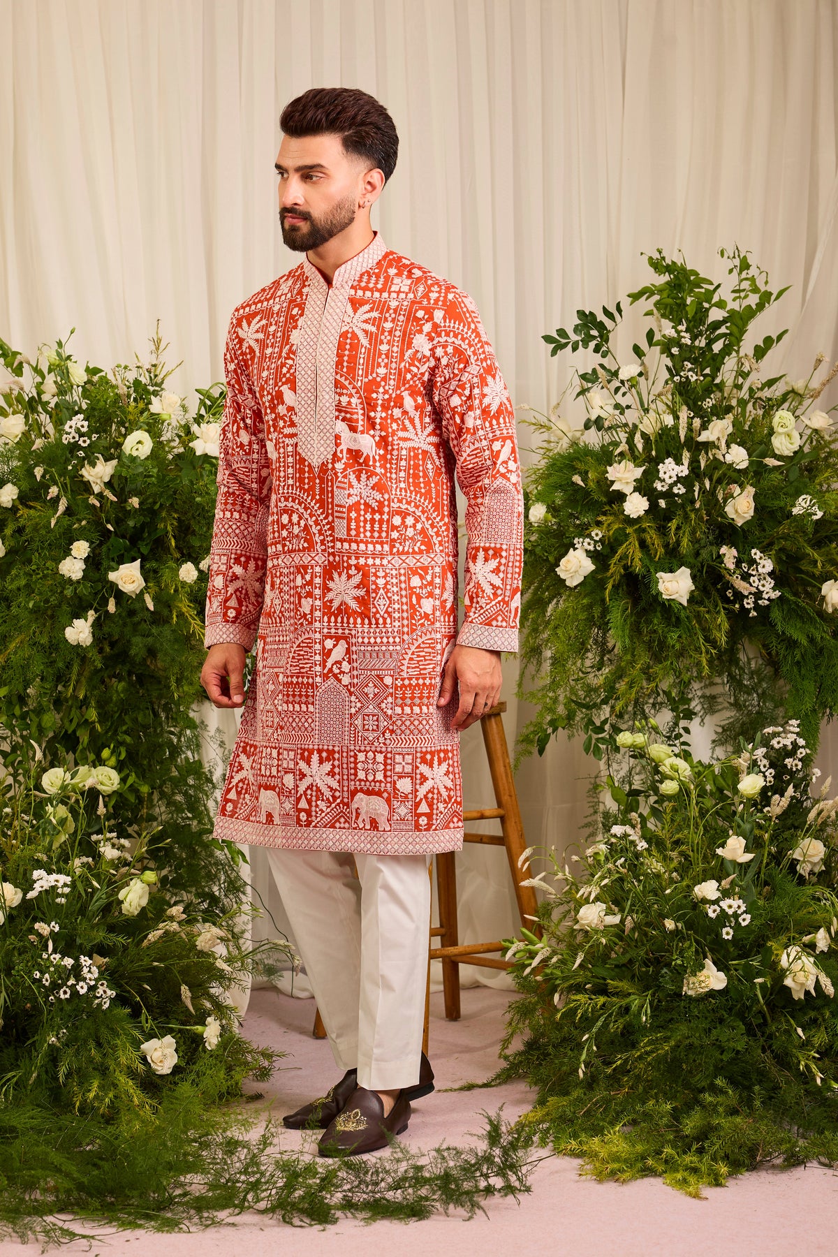 The Imperial — An orange Kurta Alive with Flora and Fauna