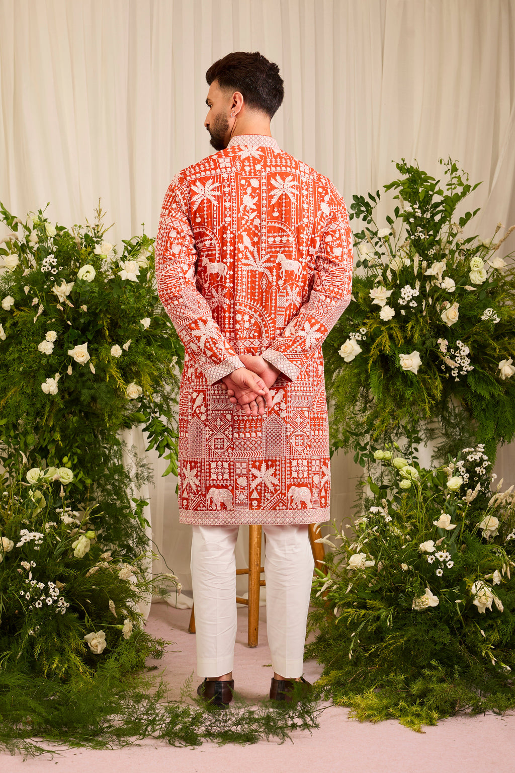 The Imperial — An orange Kurta Alive with Flora and Fauna