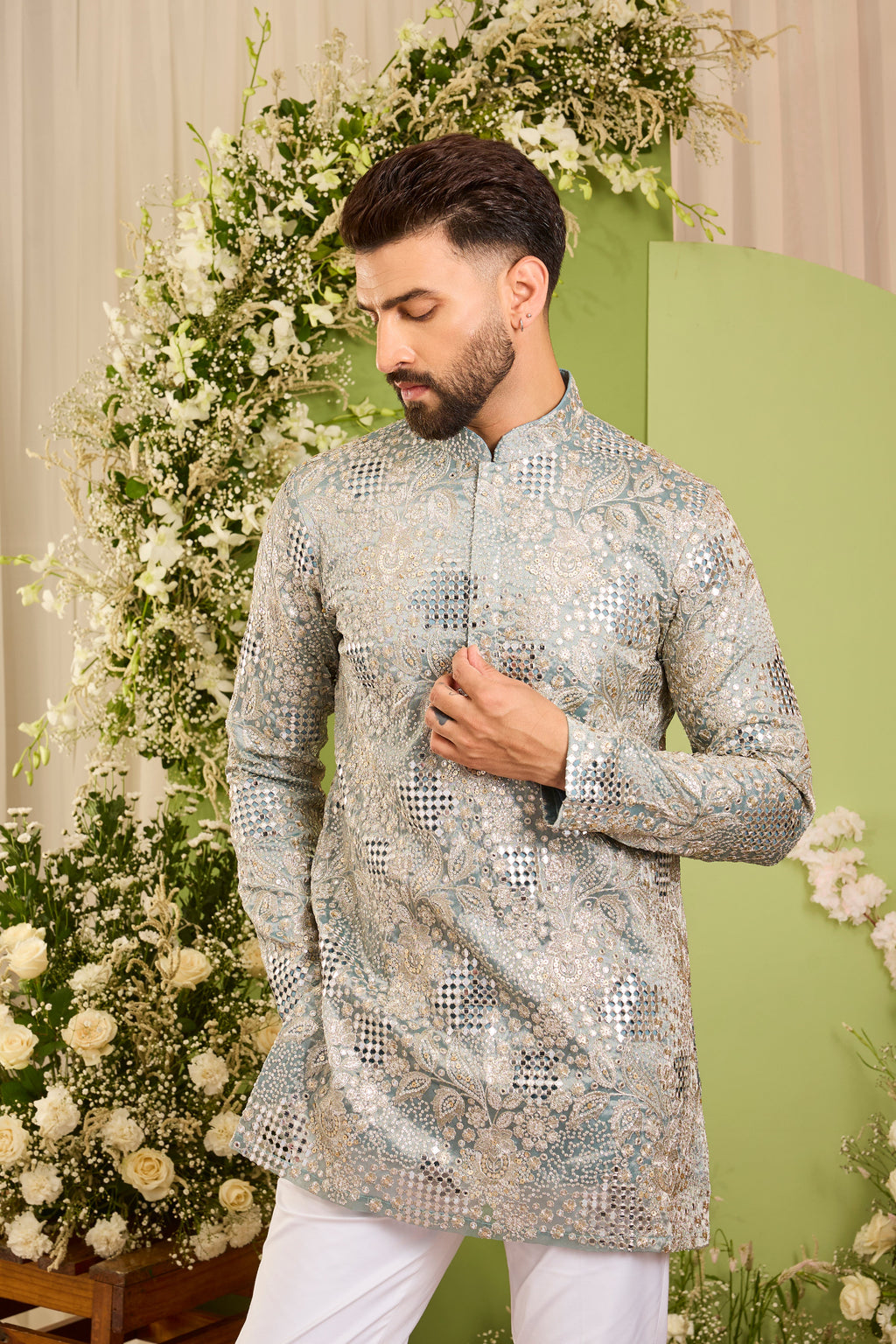 The iconic mirror work —  Blue mirror work Kurta Richly Embellished with Floral Detail