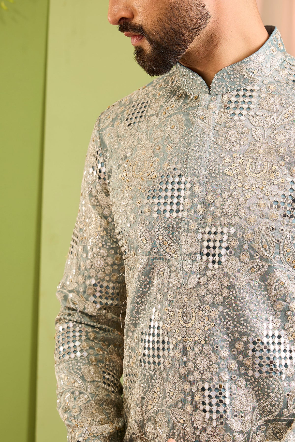 The iconic mirror work —  Blue mirror work Kurta Richly Embellished with Floral Detail