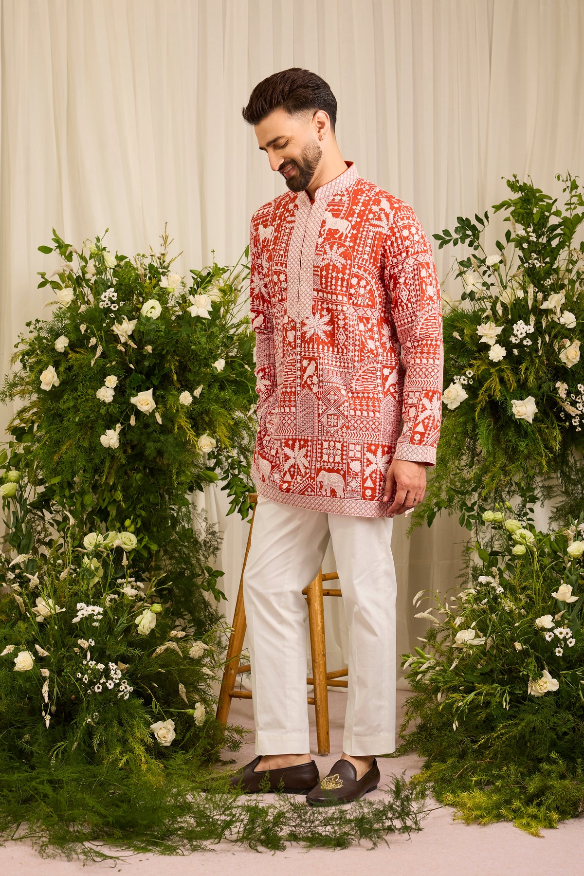 The Imperial — An orange short  Kurta Alive with Flora and Fauna
