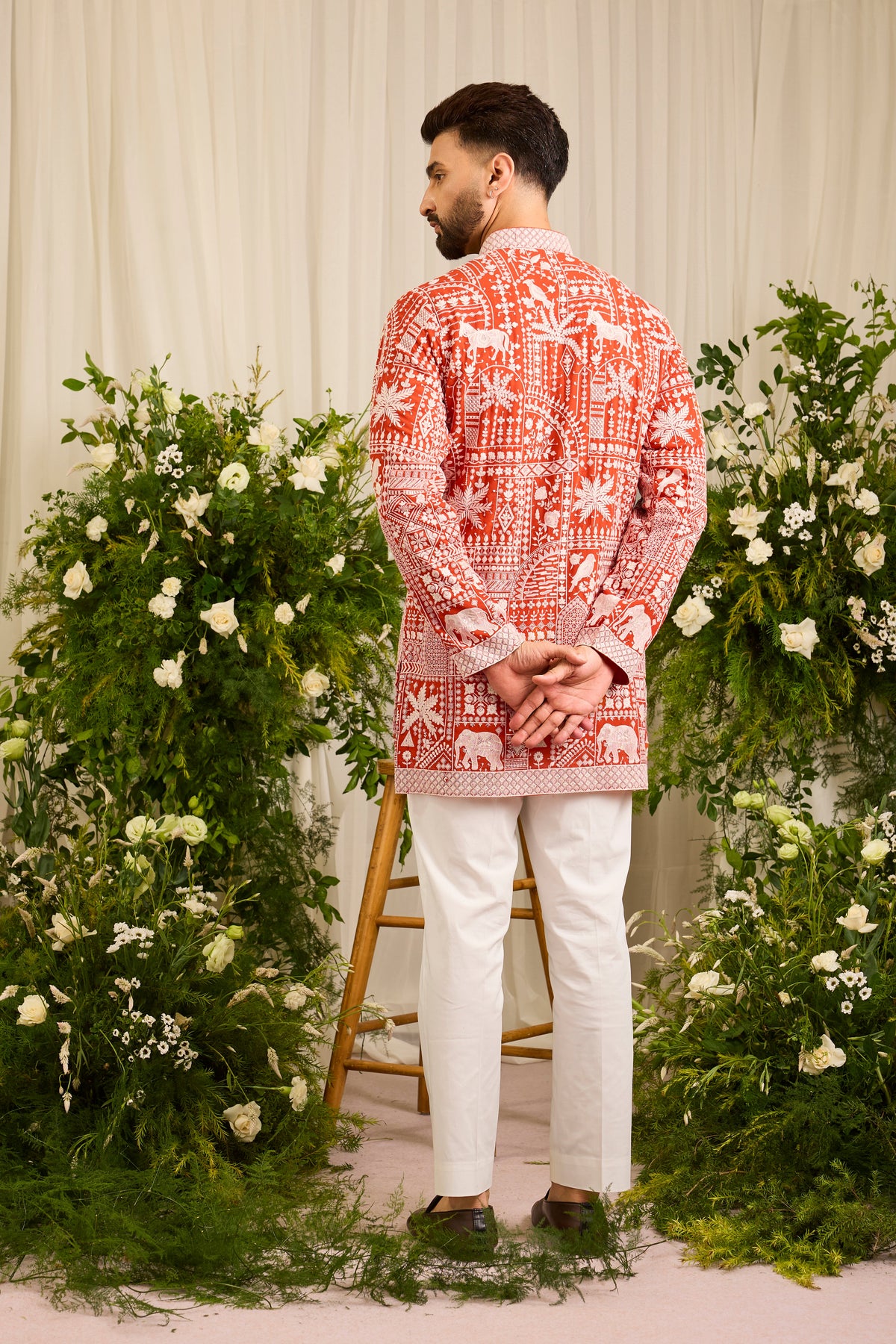 The Imperial — An orange short  Kurta Alive with Flora and Fauna