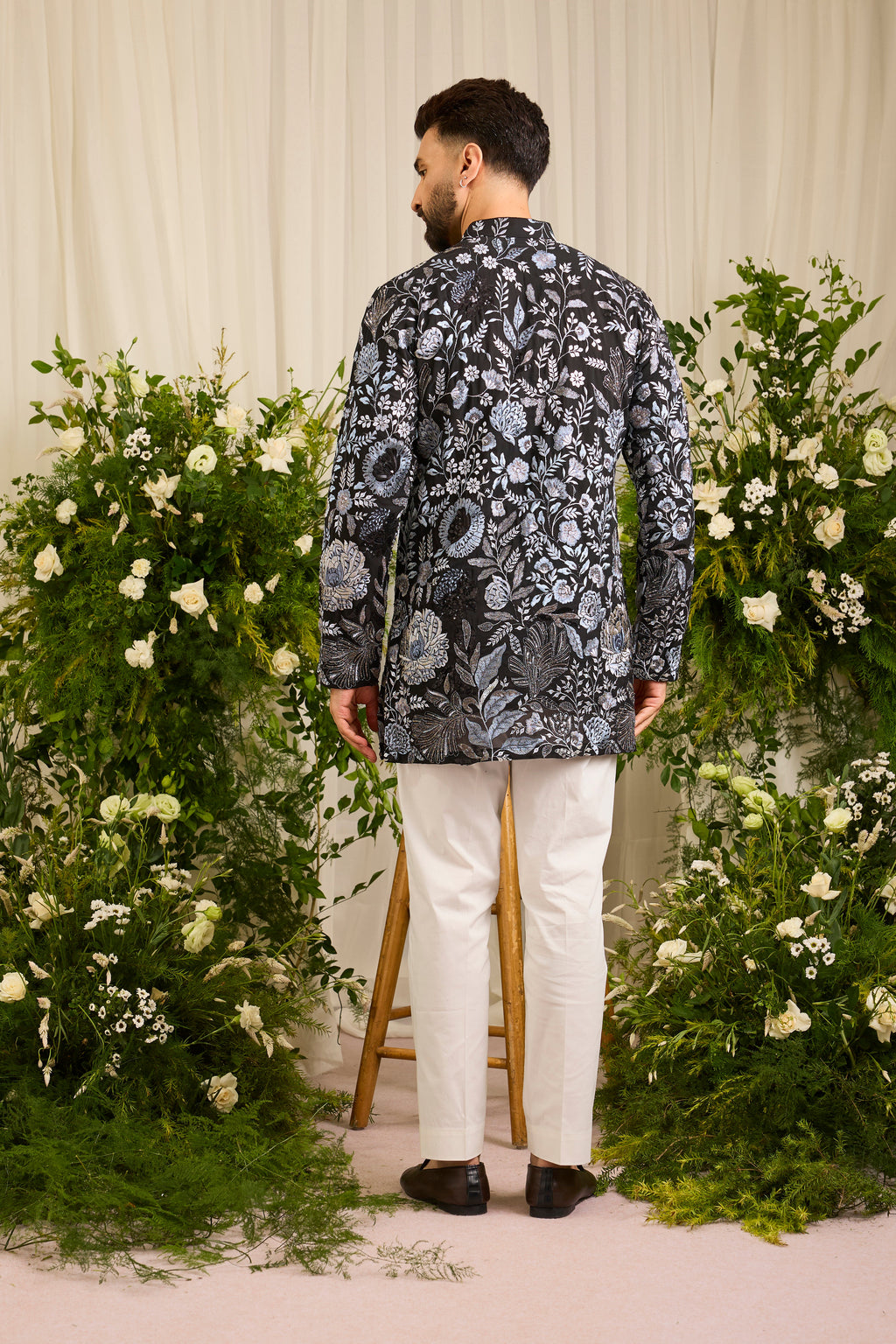 The Calderon — A Black Kurta Draped in Intricate Floral Threadwork