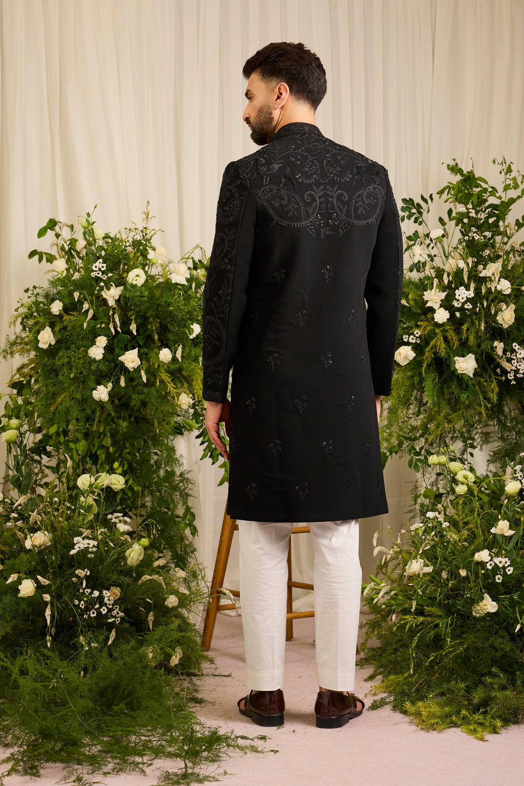 The Royal Crest - Black Sherwani Defined by Sculptural Deer Embroidery