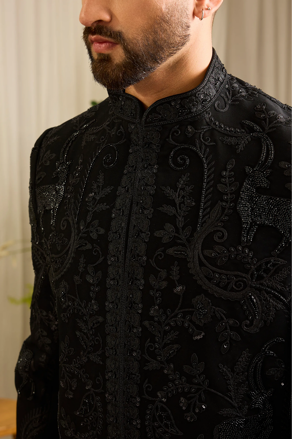 The Royal Crest - Black Sherwani Defined by Sculptural Deer Embroidery