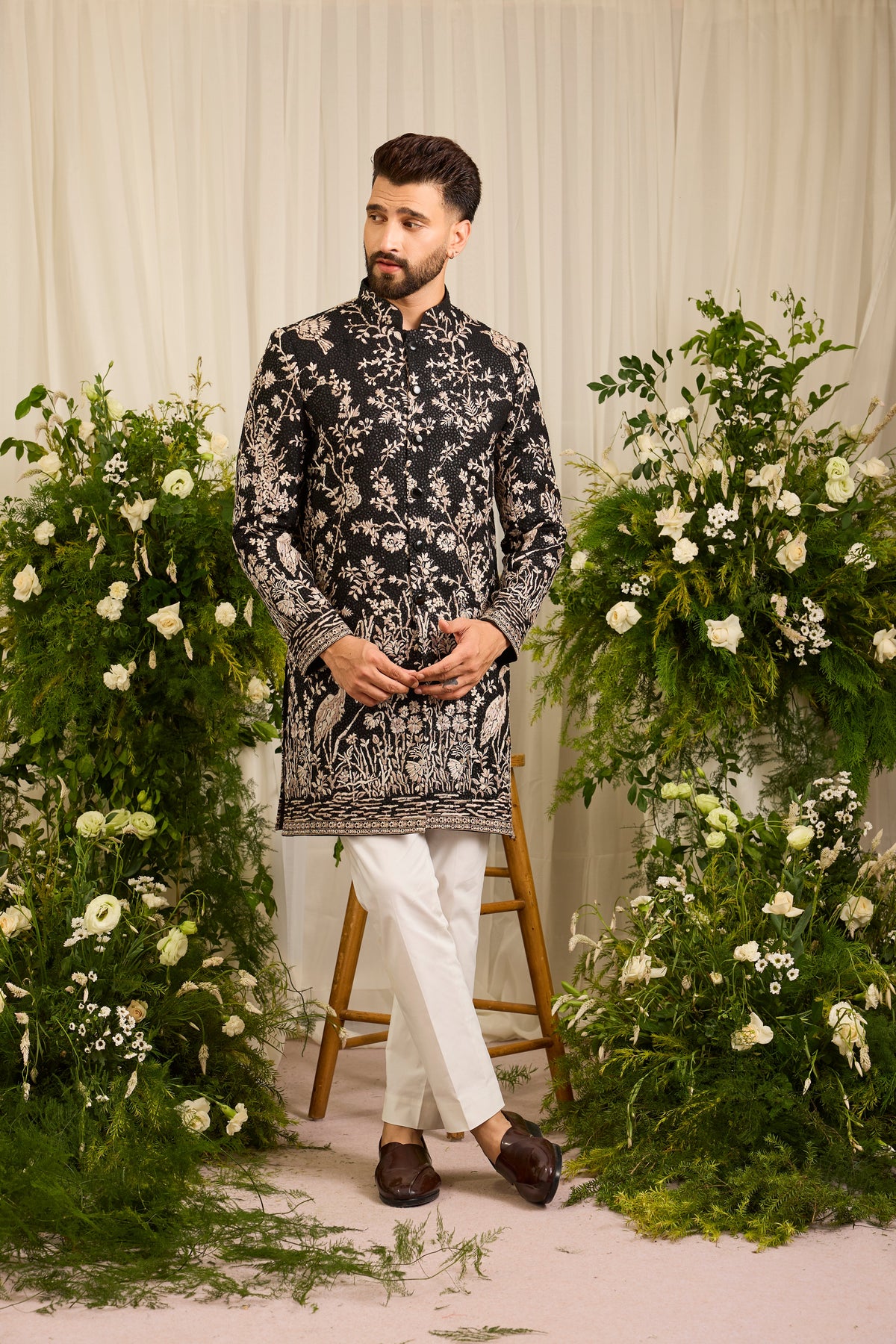 A Midnight Sequin short sherwani Embellished in Golden Threadwork and majestic flamingos