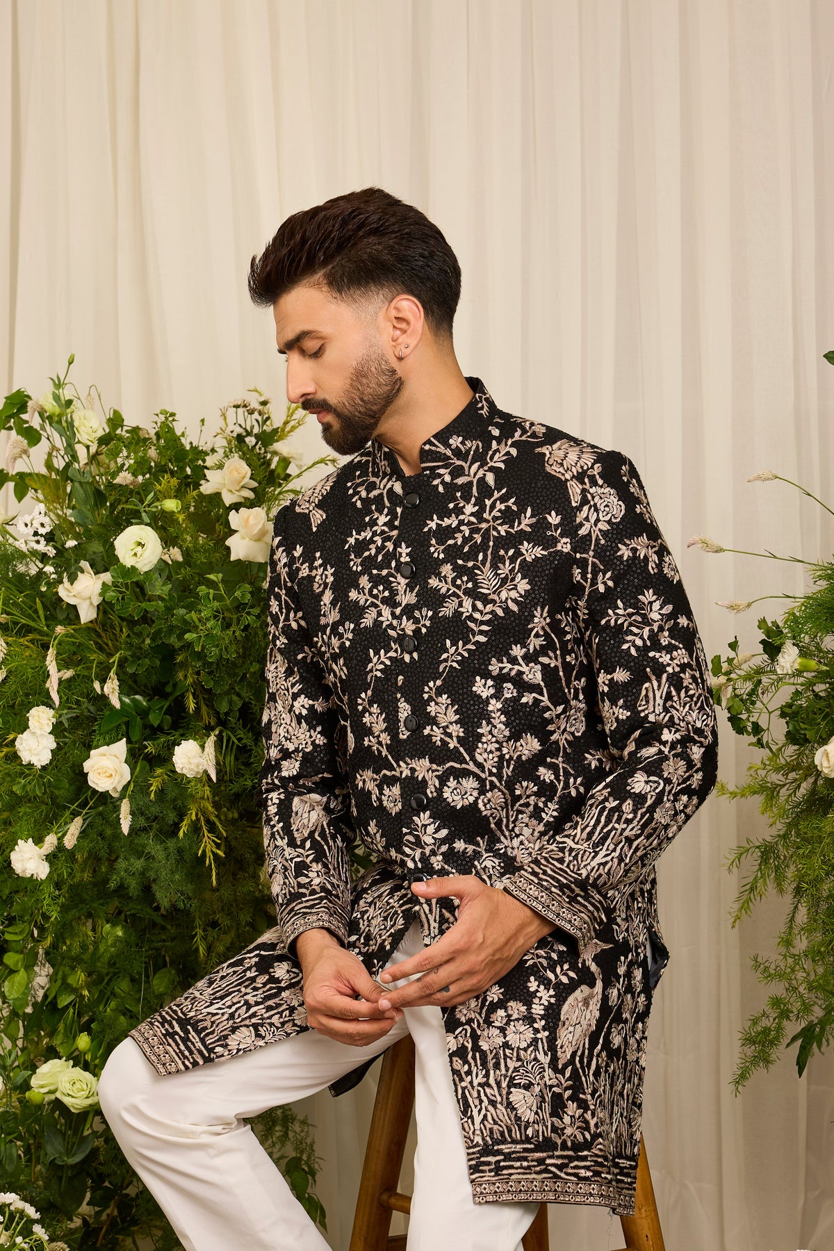 A Midnight Sequin short sherwani Embellished in Golden Threadwork and majestic flamingos