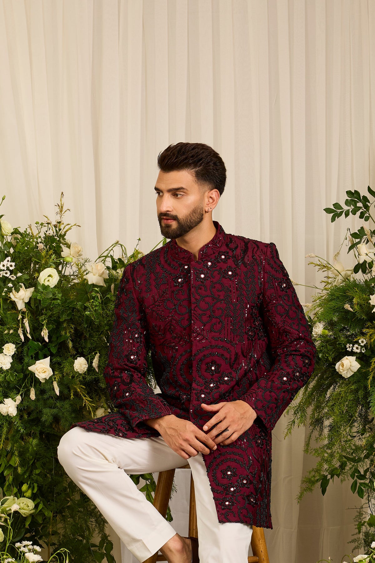 The Lannister - A Maroon Sherwani with Sculptural Black Embellishment