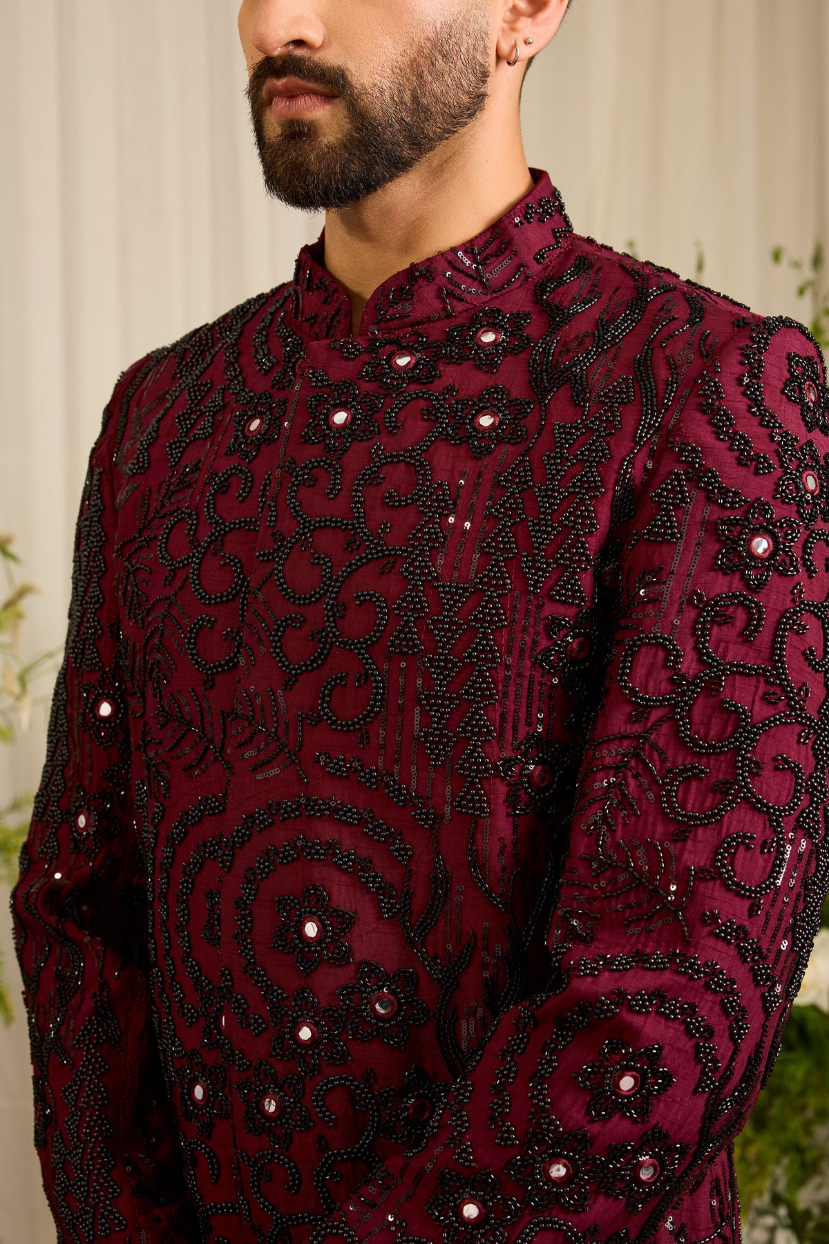 The Lannister - A Maroon Sherwani with Sculptural Black Embellishment